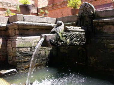 Durbar Square, Patan, Kathmandu, Nepal, August 20, 2011: Fresh water fountain in Durbar Square, Patan, Kathmandu, Nepal
