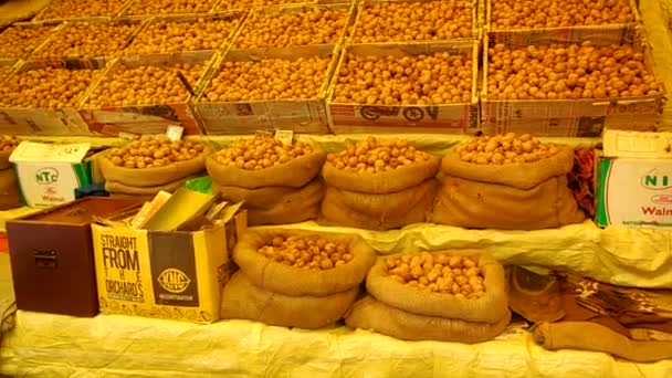 Many Walnut Dry Fruits Stocked Market — Vídeo de stock