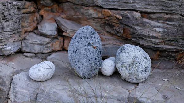 Zen meditation background - balanced stones stack cairn close up on sea beach, Zen balance, minimalism, harmony and peace