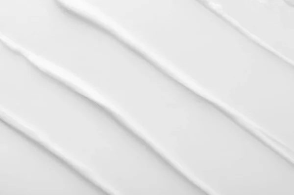 Textura de crema antienvejecimiento caro con frotis diagonales — Foto de Stock