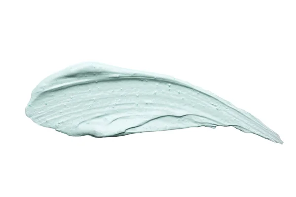 Licht azuurblauwe borstel smeren van reinigende klei masker op wit — Stockfoto