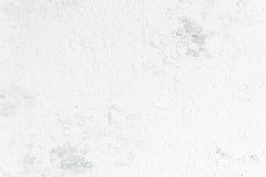 Soyut arkaplan, kopyalama alanı olan beyaz, pejmürde beton duvar.