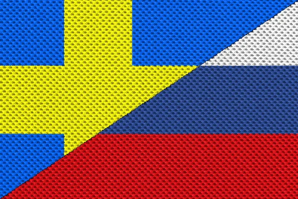 Rusya ve İsveç savaş konsepti arasındaki çatışma. Rus bayrağı ve İsveç bayrağı. İplik ve ip dokusuyla bayrak. Yatay tasarım.