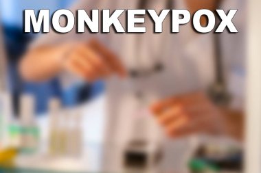 Monkeypox. Nurse. Medical. Text written on an unfocused background of a nurse with an injection to give a vaccine. Virus disease concept. Horizontal photography and design. clipart
