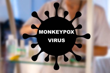 Monkeypox. Nurse. Medical. Text written on an unfocused background and virus design of a nurse with an injection to give a vaccine. Virus disease concept. Horizontal photography and design. Smallpox. clipart