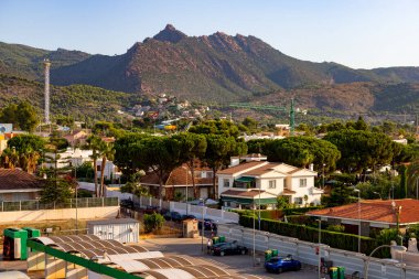Mountains. Desert of Las Palmas seen from the town of Benicasim, in Castelln. Mountainous and rocky system with green trees throughout the rocky extension, in Spain. Europe. Horizontal photography.