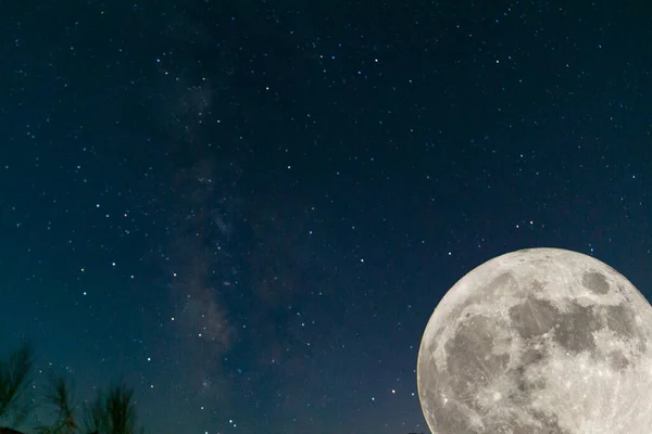 Full moon. Stars. super full moon. Full moon with the background full of stars in the galaxy. Horizontal photography. Harvest Moon. Photography. 9-10 september 2022