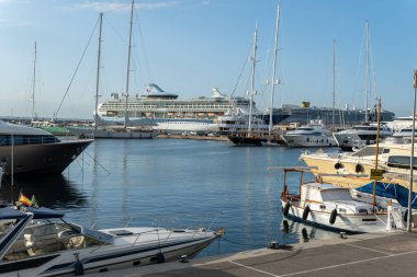 Palma de Mallorca, Spain; june 28 2022: General view of Palma de Mallorca's maritime station at dawn, with cruisers moored in the background
