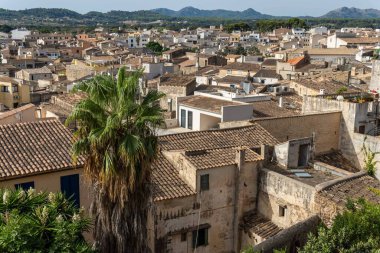 Aerial view of the tourist town of Arta at sunrise on a summer day. Located on the island of Mallorca, Spain