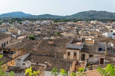 Aerial view of the tourist town of Arta at sunrise on a summer day. Located on the island of Mallorca, Spain