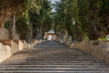 Calvary stairs leading to the Sanctuary of Sant Salvador, in the Majorcan town of Arta, at dawn on a summer day
