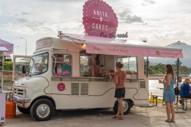 Palma de Mallorca, Spain; september 03 2022: Van Van Palma street food festival at sunset. Island of Mallorca, Spain. Van selling street food