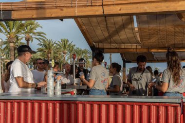 Palma de Mallorca, Spain; september 03 2022: Van Van Palma street food festival at sunset. Island of Mallorca, Spain. Van selling street food