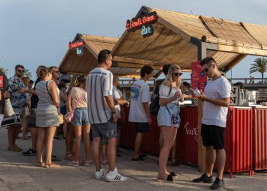 Palma de Mallorca, Spain; september 03 2022: Van Van Palma street food festival at sunset. Island of Mallorca, Spain. Van selling street food