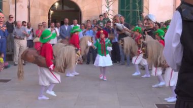 Felanitx, Spain; august 27 2022: Patron saint festivities of Sant Agusti in the Majorcan town of Felanitx. Dance of the little horses in the square of the house of culture. Spain