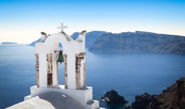 Bell tower with sea view, Oia, Santorini Island, Greece.