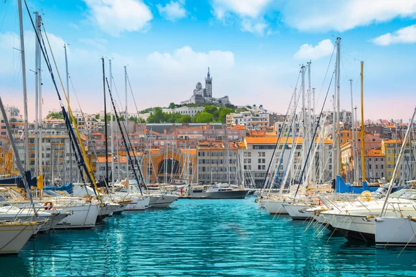 Luxury sailboats docked in old marina of Marseille, France.