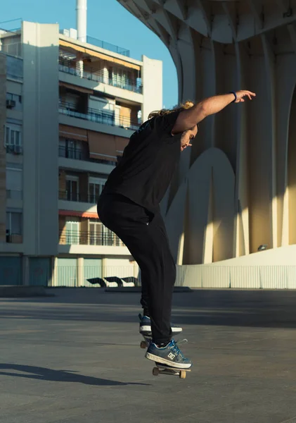 Young Man Performs Jump His Skateboard Skateboarder Training Street Boy —  Fotos de Stock