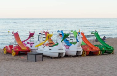 Pedal boats or pedalo on the beach of Villajoyosa.