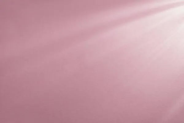 Arkaplan kağıdı pembe, sabah güneşinin ışıltılarıyla. Modern minimalist stil