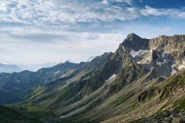 Majestic mountain hills, peaks and ranges morning landscape. Wild nature view