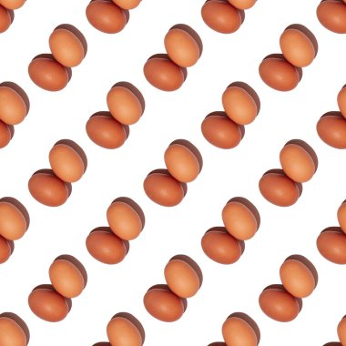 Beyaz arka planda izole edilmiş sert gölgeli bej yumurta çiftlerinin kusursuz sonsuz deseni.