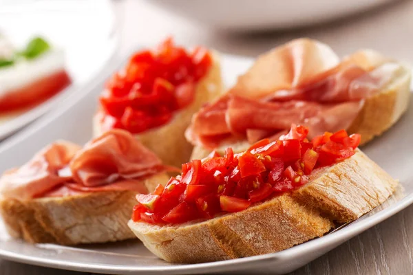 Italian Appetizer Bruschetta Parma Ham Fresh Tomatoes Plate — Stock Photo, Image