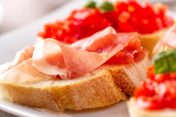 Italian Appetizer Bruschetta Parma Ham Fresh Tomatoes Plate — Stock Photo, Image