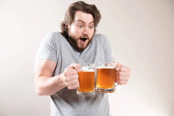 Portrait Happy Young Bearded Man Holding Two Beer Mugs Isolated — Stock Photo, Image