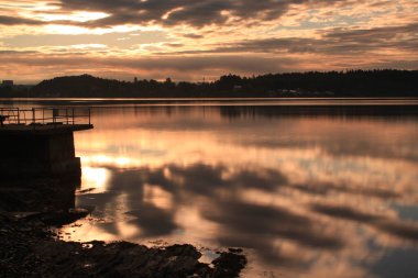 reflection of clouds in calm water - Lysaker