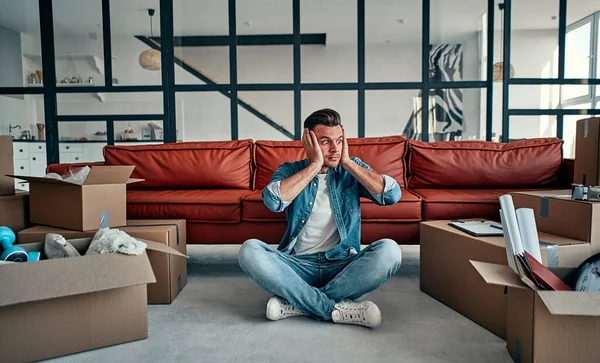 Handsome Young Man Moving New Home Boxes Having Doubts Confuse — Stock Photo, Image
