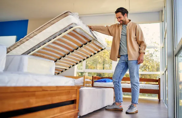 Man Chooses Bed Store Examines Frame Slats Purchase Mattress Bed — Stock Photo, Image