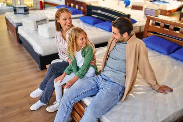 Family Cute Little Daughter Choosing Bed Store Purchase Mattress Bed — Stock Photo, Image