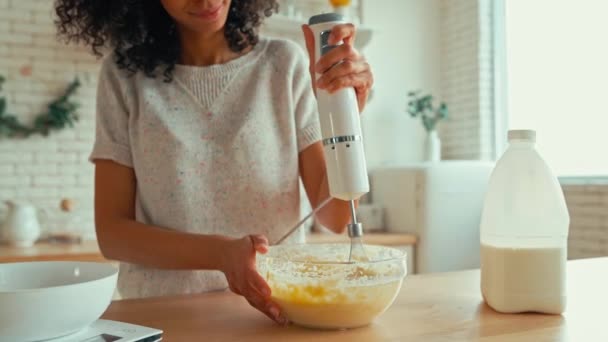 Cute African American Woman Curly Fluffy Hair Whisking Eggs Blender — Stock Video