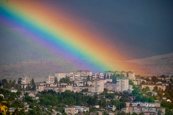 Autumn landscape of the city of Vanadzor. beautiful rainbow over city