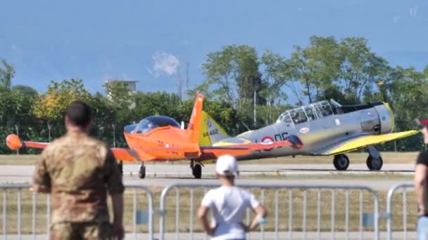 Historic propeller planes taxi on the runway to prepare for take-off — Stock Video