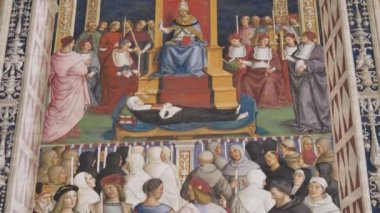Pius II, Piccolomini Kütüphanesi 'nde Pinturicchio' nun Aziz Catherine 'ini kutsadı.