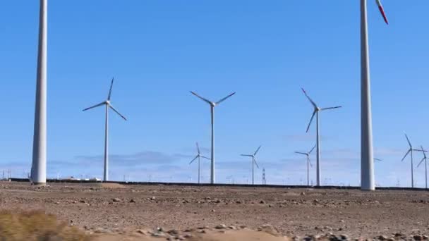 Wind farm panorama in deserted field — Wideo stockowe