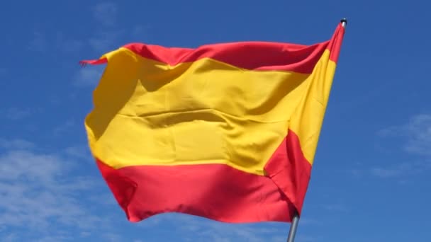 Spanish Flag Waving in the Wind in Slow Motion Close Up with sky background — Stockvideo
