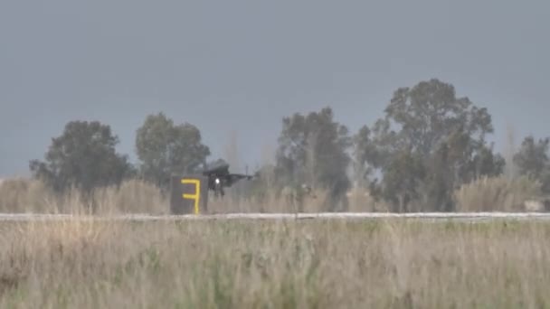 Military airplane landing on air force base. NATO and US supersonic interceptor — стокове відео