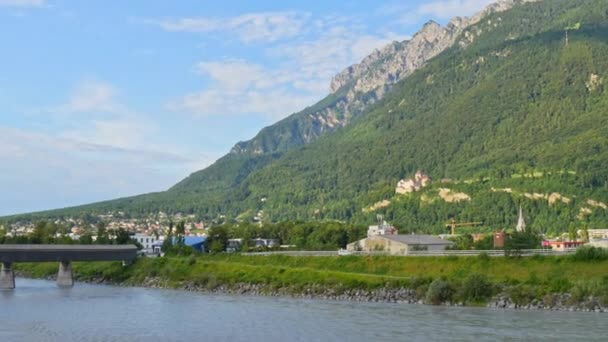 View along the Rhine river in the Swiss alpine scenery on a beautiful cloudy day — 비디오