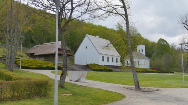 Tesla birthplace in Smiljan and St Peter and Paul Church where his father served — Stock Video