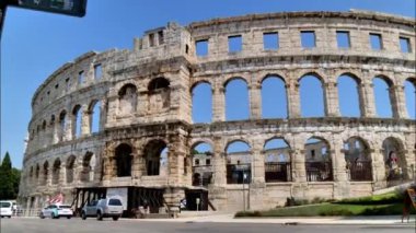 Pula Croatia AUGUST, 15, 2020 Arena of Pula Istria Croatia in 4K time lapse in sunny summer day. Famous roman amphitheater visited by tourists.
