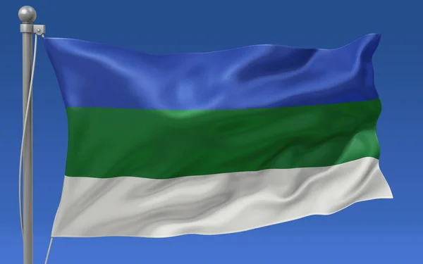 The flag of Komi waving at the top of a flagpole with a blue sky in the background
