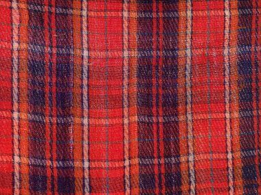 Kırmızı kumaş dokusu arkaplanını kapat