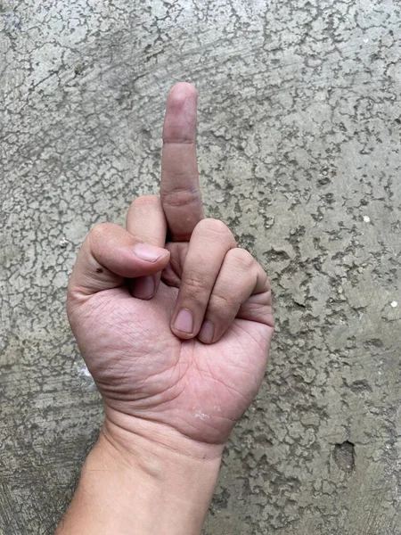 Mano Sosteniendo Dedo Sobre Fondo Blanco — Foto de Stock