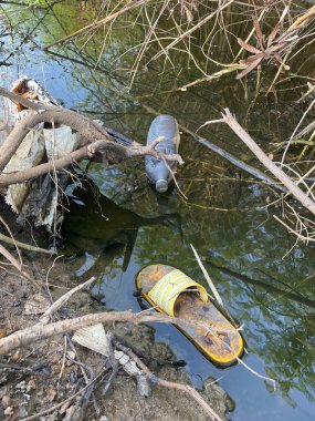 Plastic bottle garbage in river