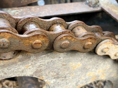 old rusty metal wheel on a background of the car