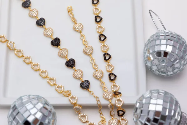 Diamond Encrusted Gold Bracelets Small Disco Balls White Plate Soft — Stock Photo, Image
