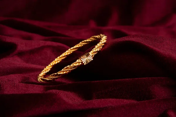 Gold Bracelet Burgundy Velvet Fabric — Stock Photo, Image